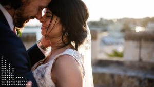 Tania & Ken romantic pose for portugal wedding on the ocean